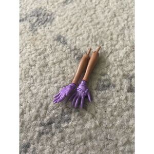 Monster High doll forearm and hand with purple glove